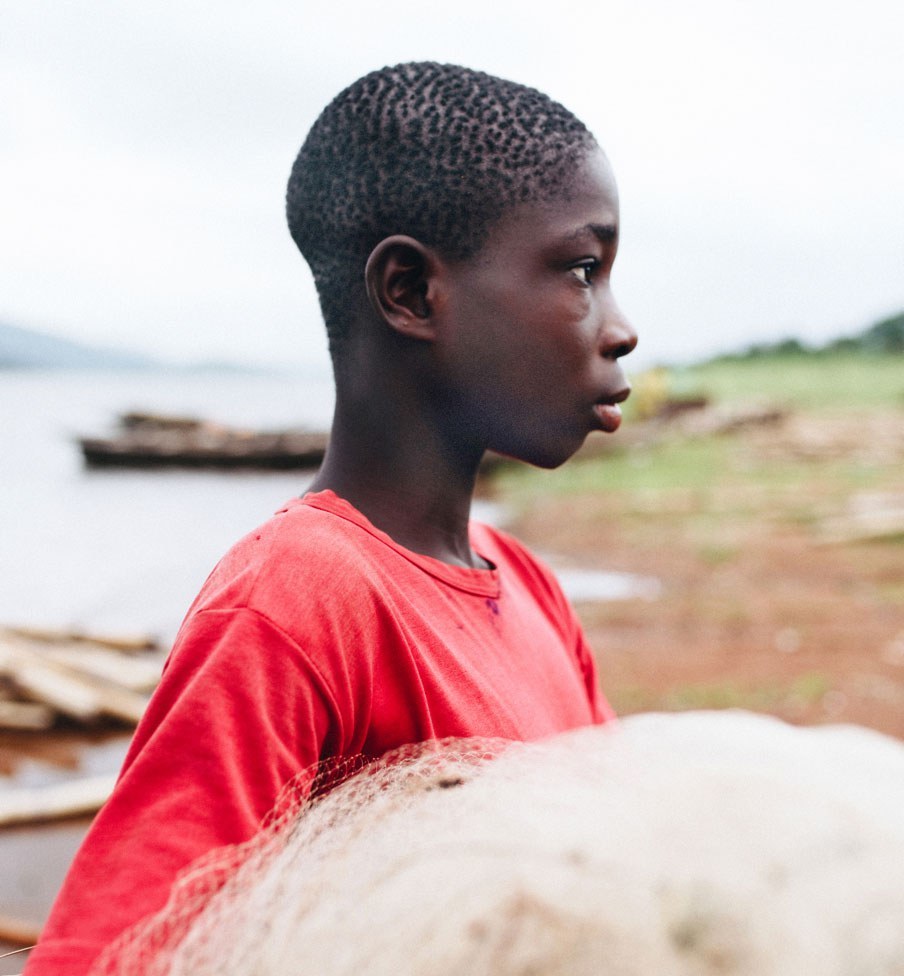 Boy holding fishing net